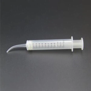 What are the components of a dental syringe?